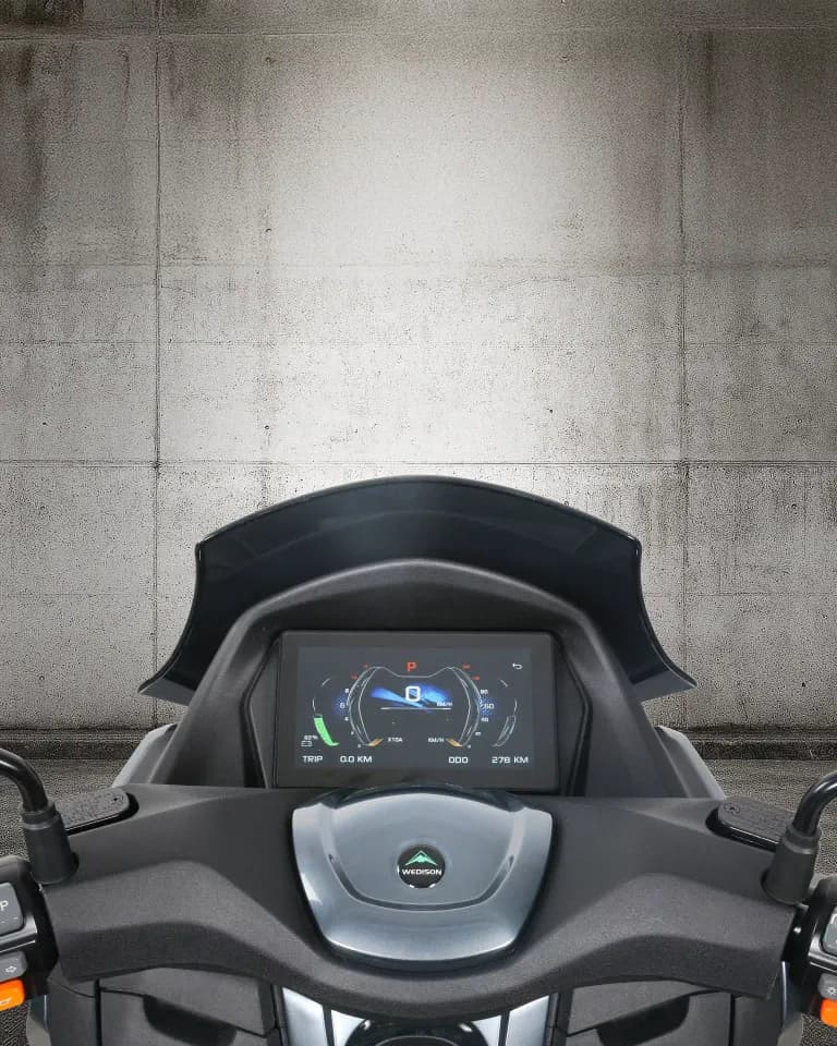 Cockpit view showcasing the large TFT display with Apple CarPlay & Android Auto interface
