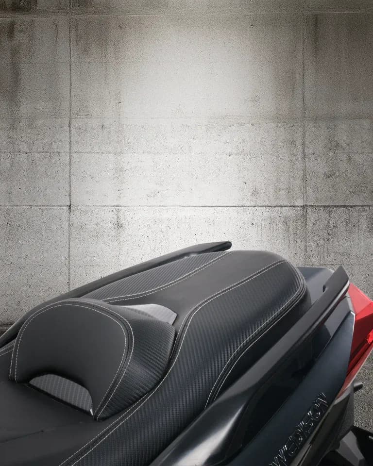 Rear three-quarter angle highlighting EdPower’s broad stance and wide seat