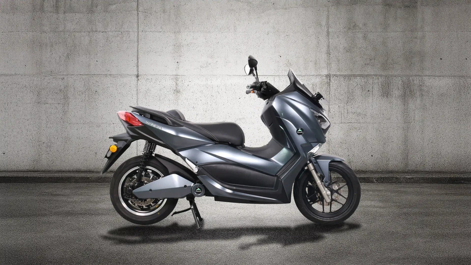 EdPower from a dramatic side profile, emphasizing its wide seat, bold stance, and tech-forward look.